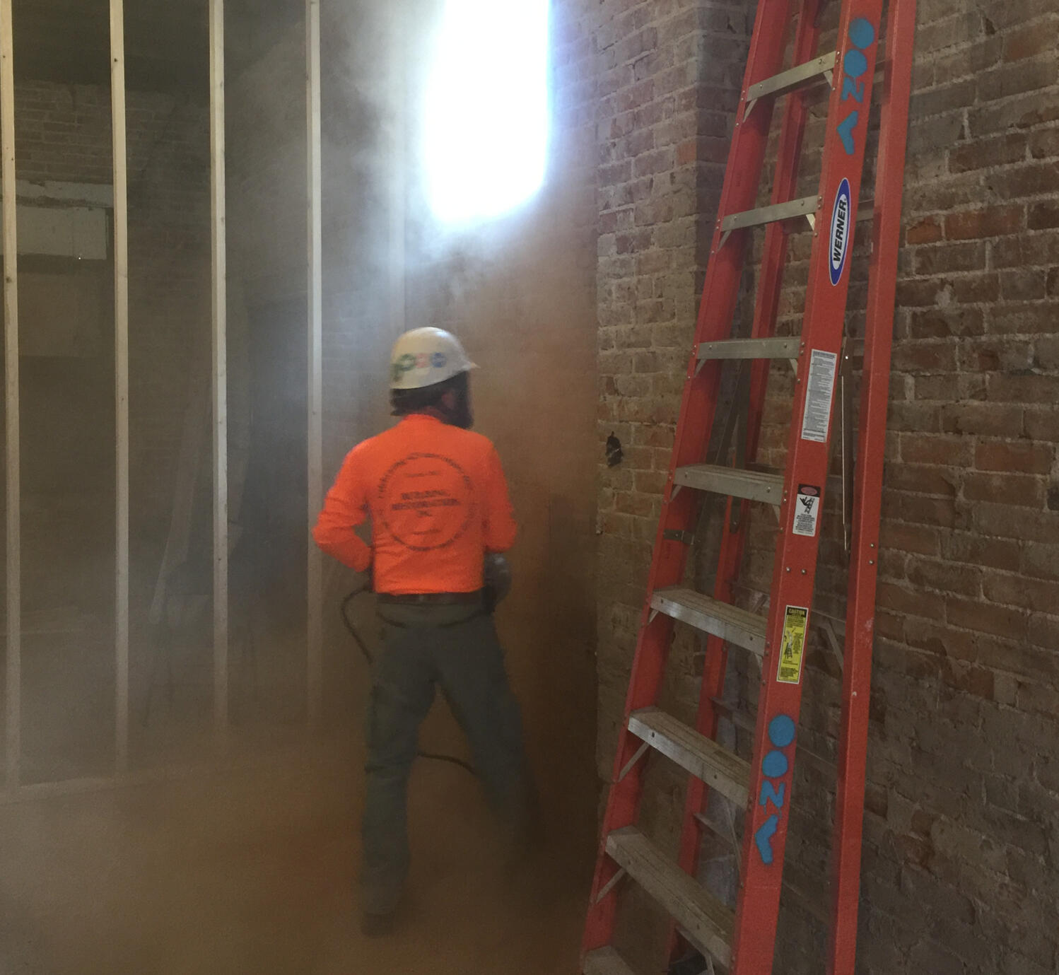 Blair cutting some brick